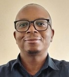 Dr. MAKONDO, C.